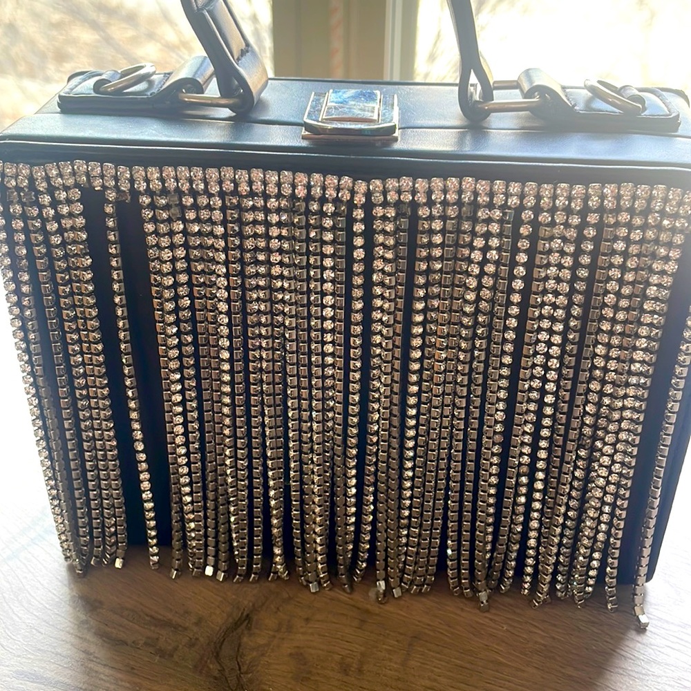 Akira fringed hand bag